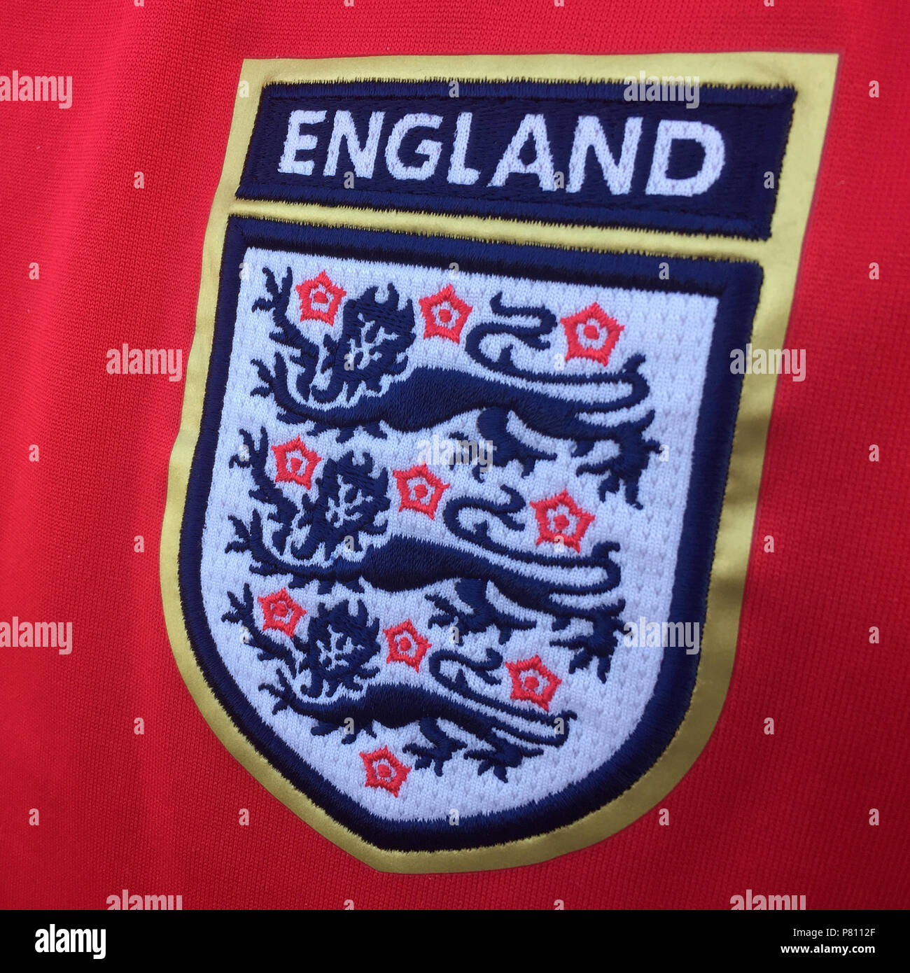 LONDON, UK - JULY 8th 2018: Red England national football shirt with the three lions emblem Stock Photo