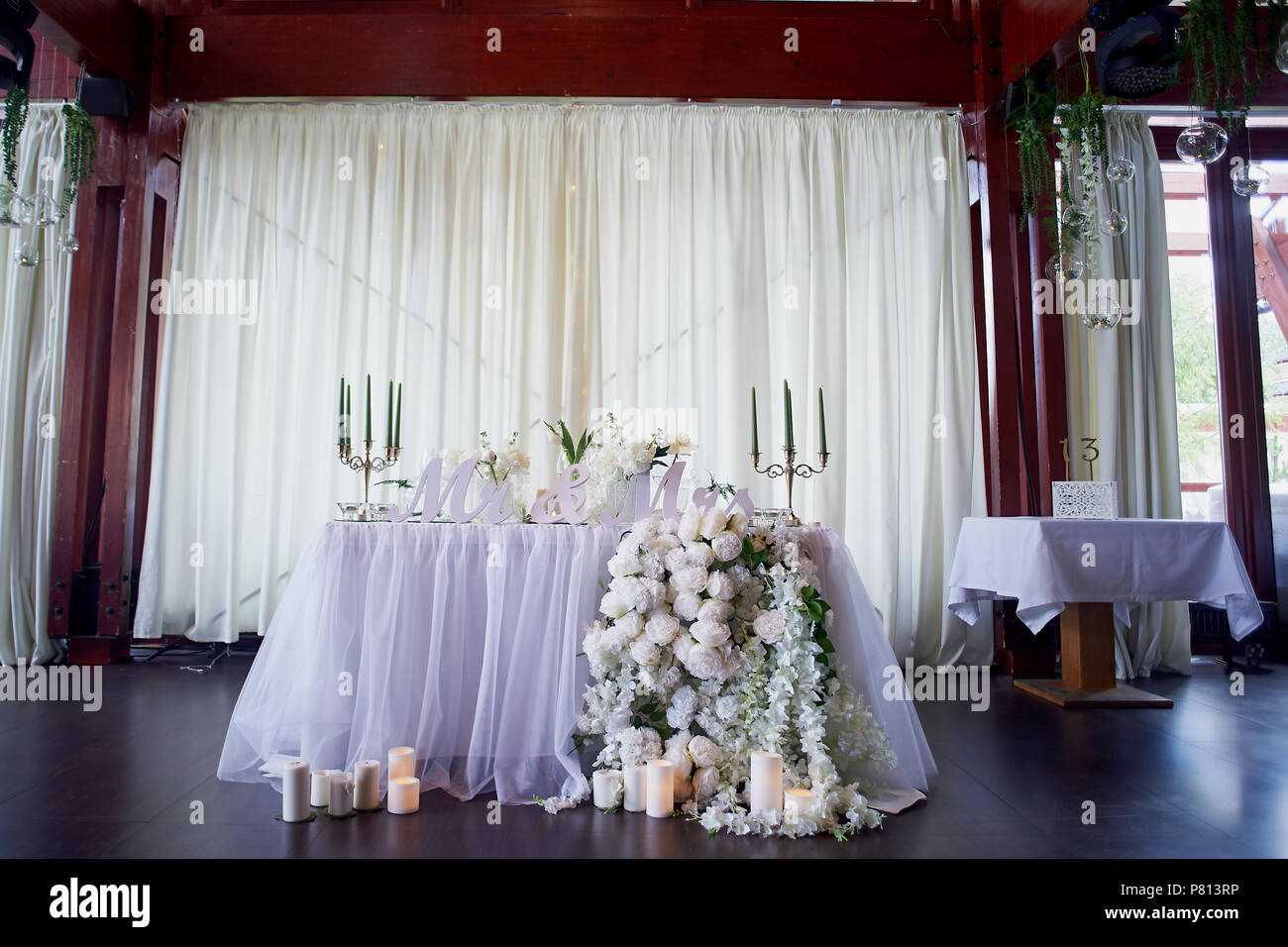 Flower Garland Of Pine Shaped Roses Hangs From The Table Wedding