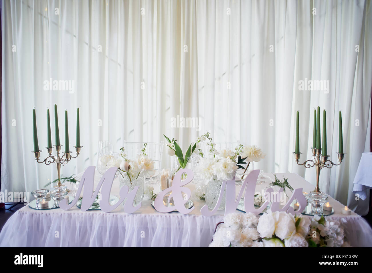 Flower Garland Of Pine Shaped Roses Hangs From The Table Wedding