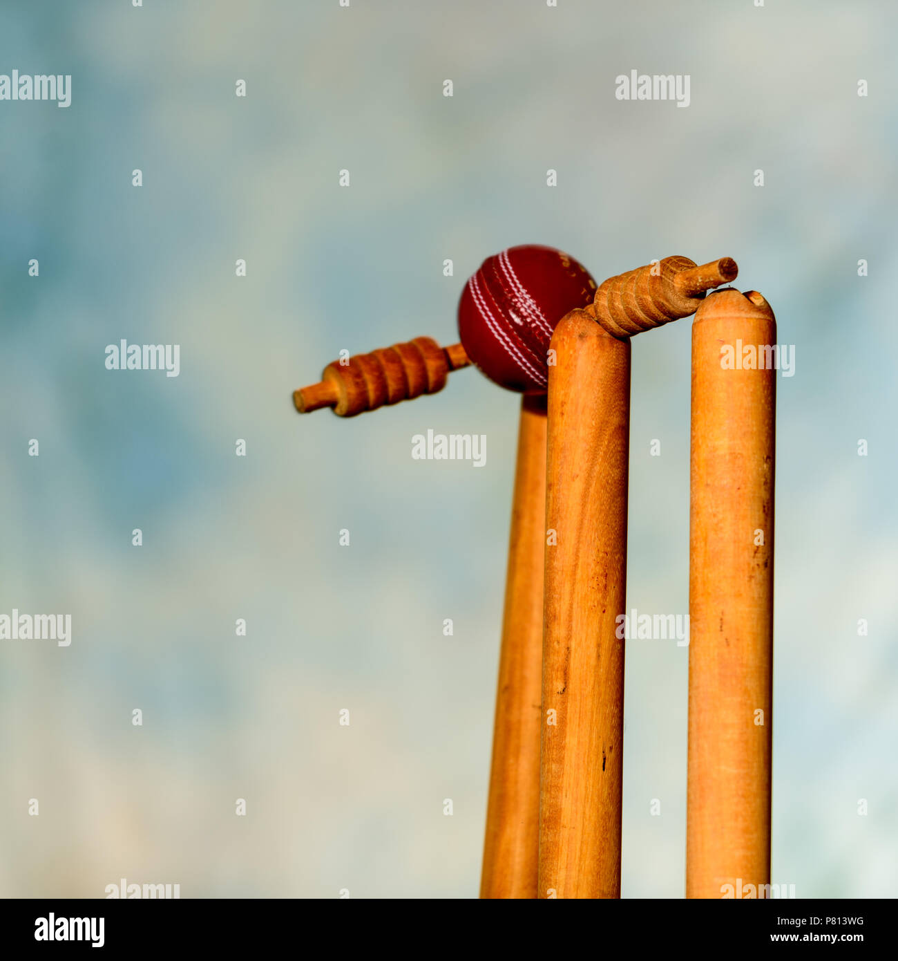 Bails fly Cricket Ball hits stumps Stock Photo Alamy