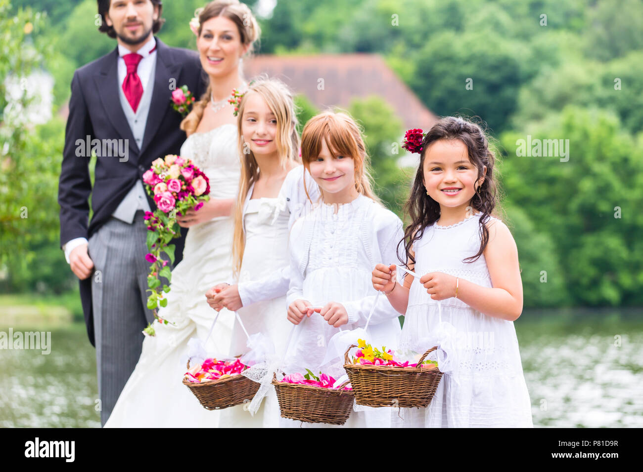 Wedding bridesmaids children with flower basket Stock Photo