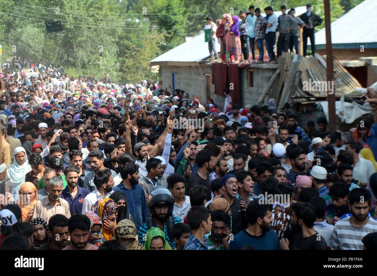 Kulgam, India. 07th July, 2018. Three youth, including a girl, were killed by government forces in Hawoora, Khudwani in district Kulgam on July 07, 2018. The youth identified as Shakir Ahmad, 22, Irshad Majid, 20, Andleeb, 16, were killed after clashes had erupted in the area following a Cordon and Search Operation (CASO) in Hawoora. Credit: Muneeb Ul Islam/Pacific Press/Alamy Live News Stock Photo