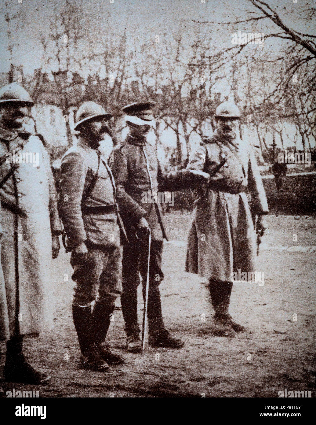 On November 6, 1918, German delegates left Berlin to ask the generalissimo of the Allied forces for an Armistice. The delegates were met by Staff Officers and because the armistice had not been granted were led blindfolded through the Allied Lines. Stock Photo