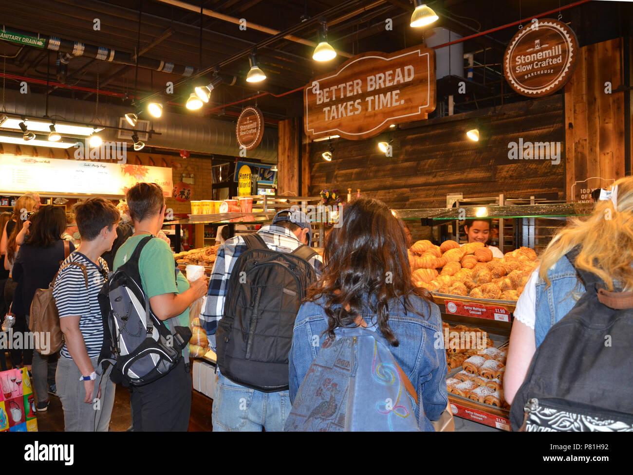 TORONTO, ON / CANADA - MAY 26, 2018: Shoppers stop at the Stonemill Bakehouse inside the St. Lawrence Market. Stock Photo