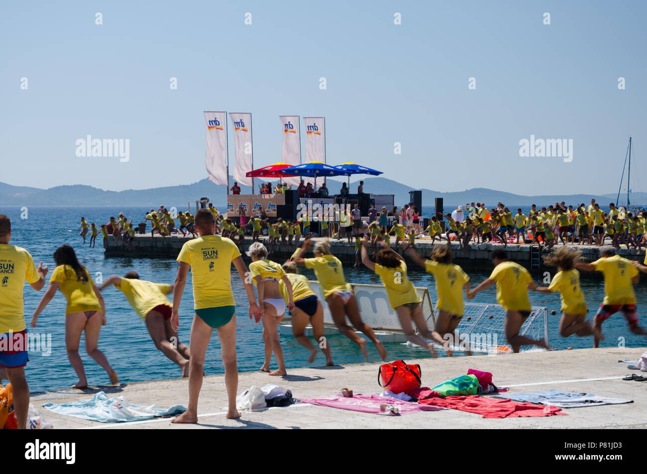 Millenium Jump  A jump of more than 3,000 individuals from the central Zadar waterfront in the sea. Croatia Stock Photo