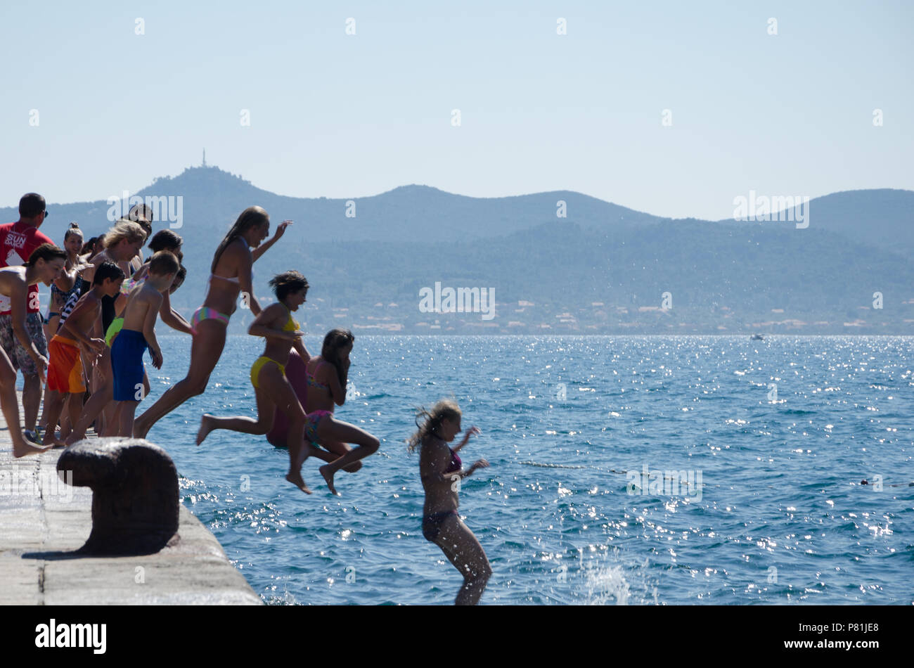 Millenium Jump  A jump of more than 3,000 individuals from the central Zadar waterfront in the sea. Croatia Stock Photo