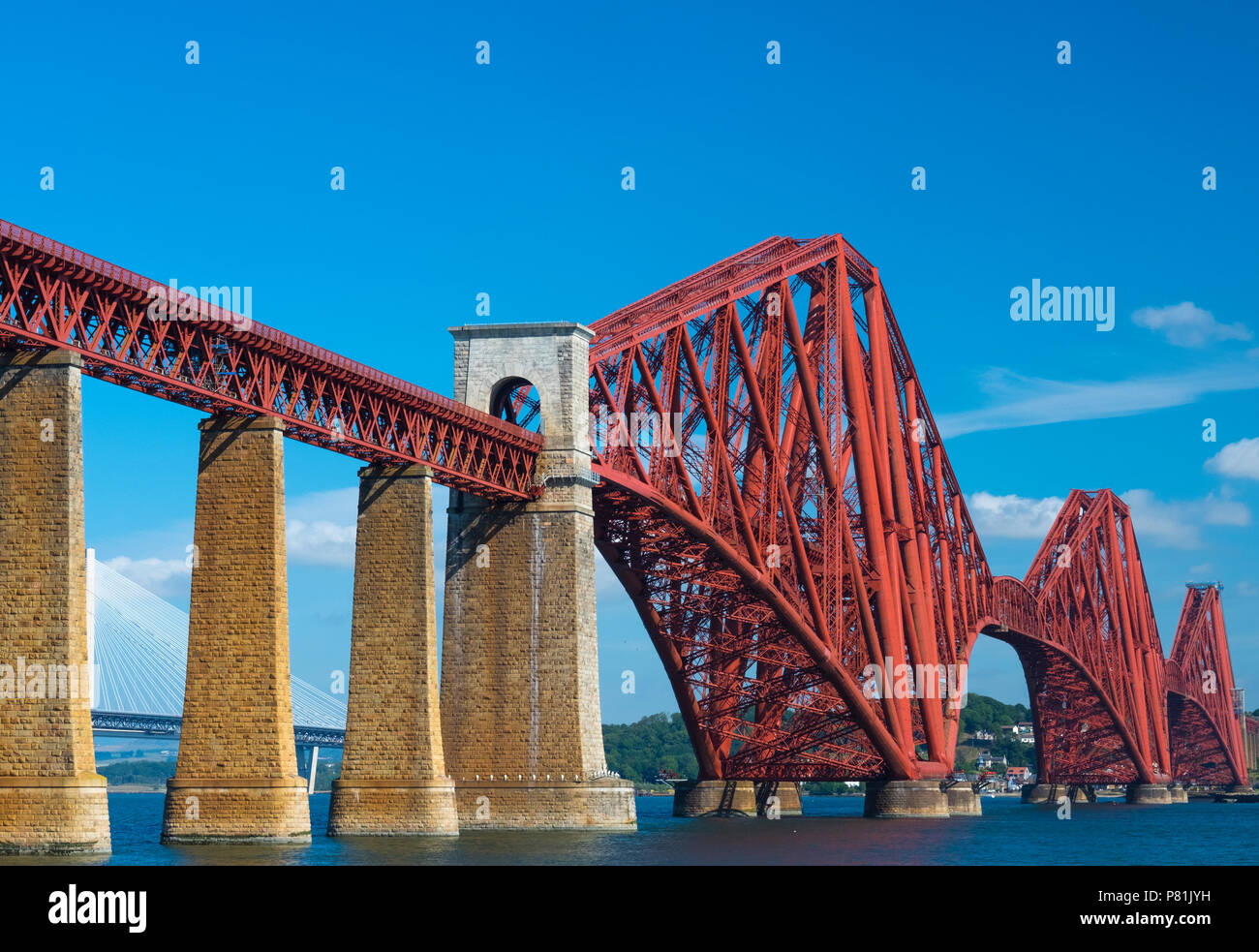 The iconic Forth Bridge spans the Firth of Forth, connecting Queensferry and North Queensferry, summer 2018. Stock Photo