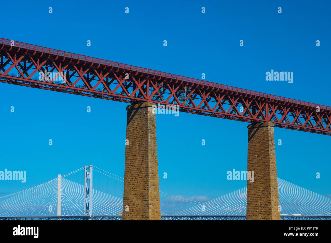 The Forth (rail) Bridge with the Forth Road Bridge and Queensferry Crossing in the background, summer 2018. Stock Photo