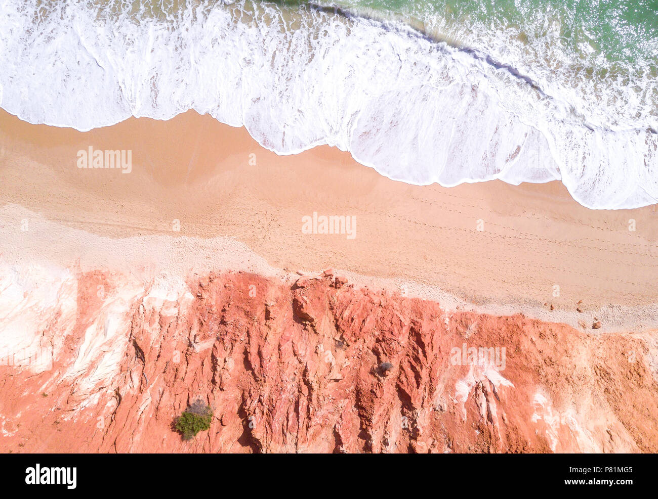 Aerial view of tropical sandy beach and ocean with turquoise water