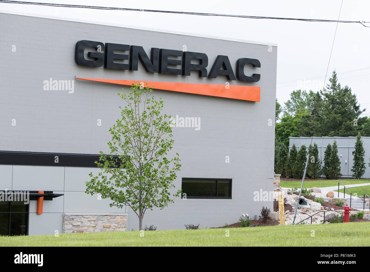 A logo sign outside of the headquarters of Generac Power Systems in