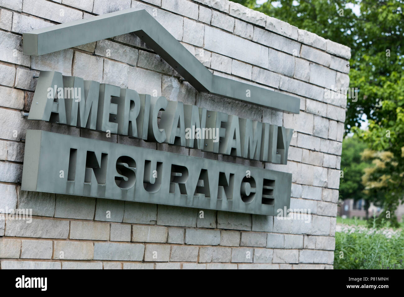A logo sign outside of the headquarters of American Family Insurance in Madison, Wisconsin, on June 23, 2018. Stock Photo