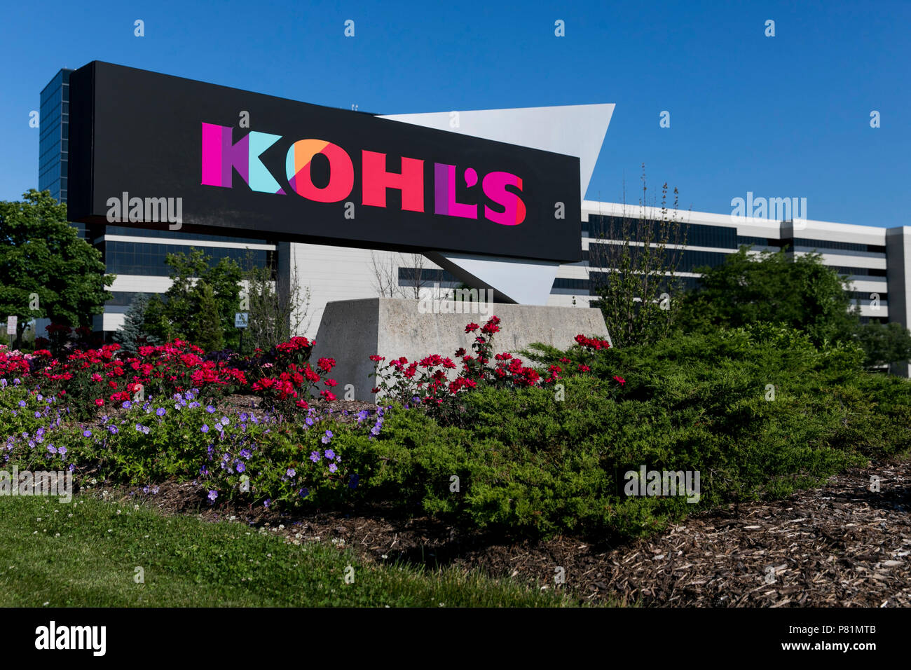 A logo sign outside of the headquarters of the Kohl's Corporation in