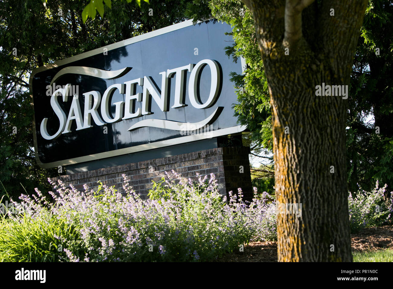 A logo sign outside of the headquarters of Sargento Foods Inc., in