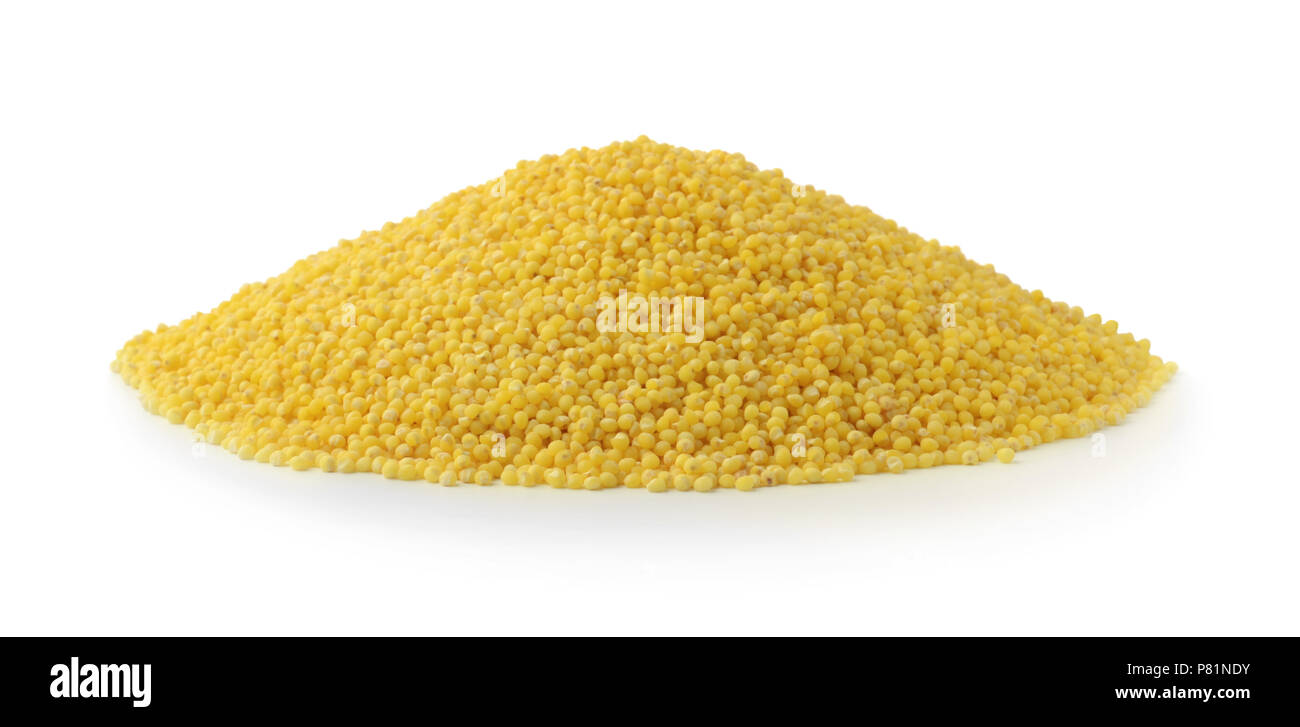 Pile of millet isolated on white background Stock Photo