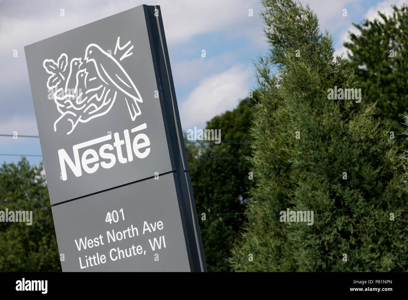 A logo sign outside of a facility occupied by Nestle USA in Little