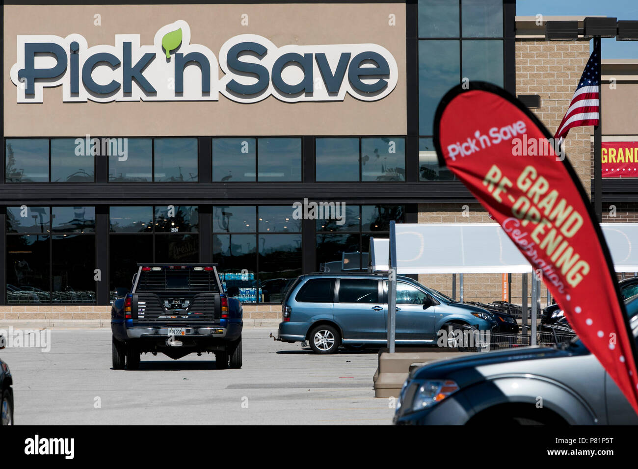 A logo sign outside of a Pick 'n Save retail grocery store in Racine