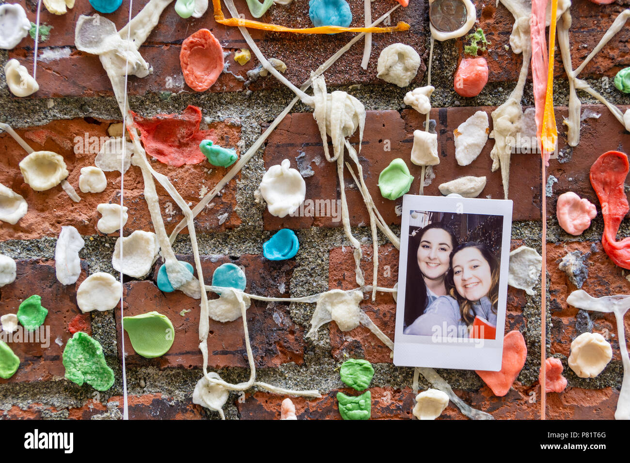 Detail of the famous Market Theater Gum Wall, local Seattle landmark located in Post Alley under Pike Place Market, WA, USA. Stock Photo