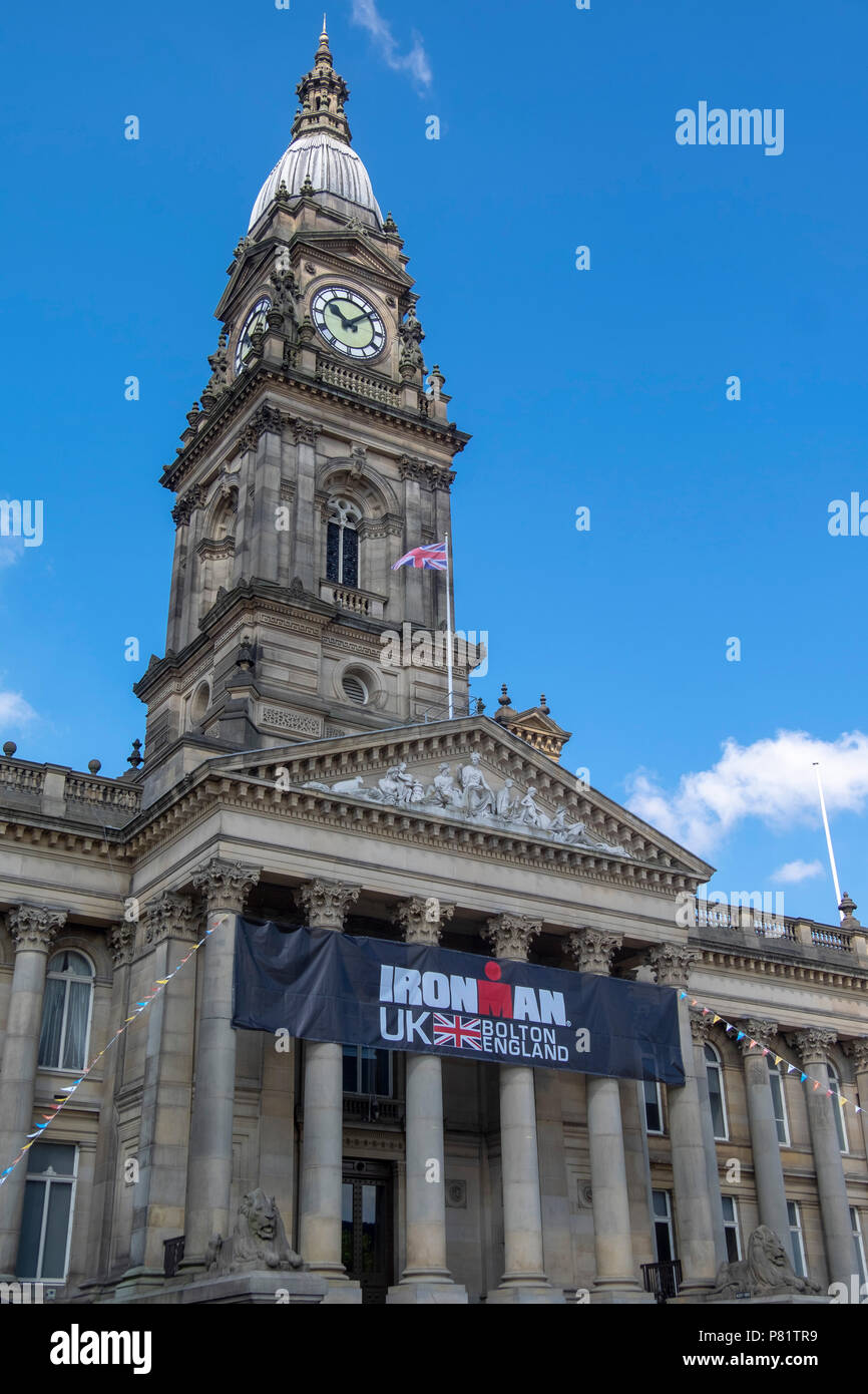 Clock tower of bolton town hall with blue sky Stock Photo Alamy