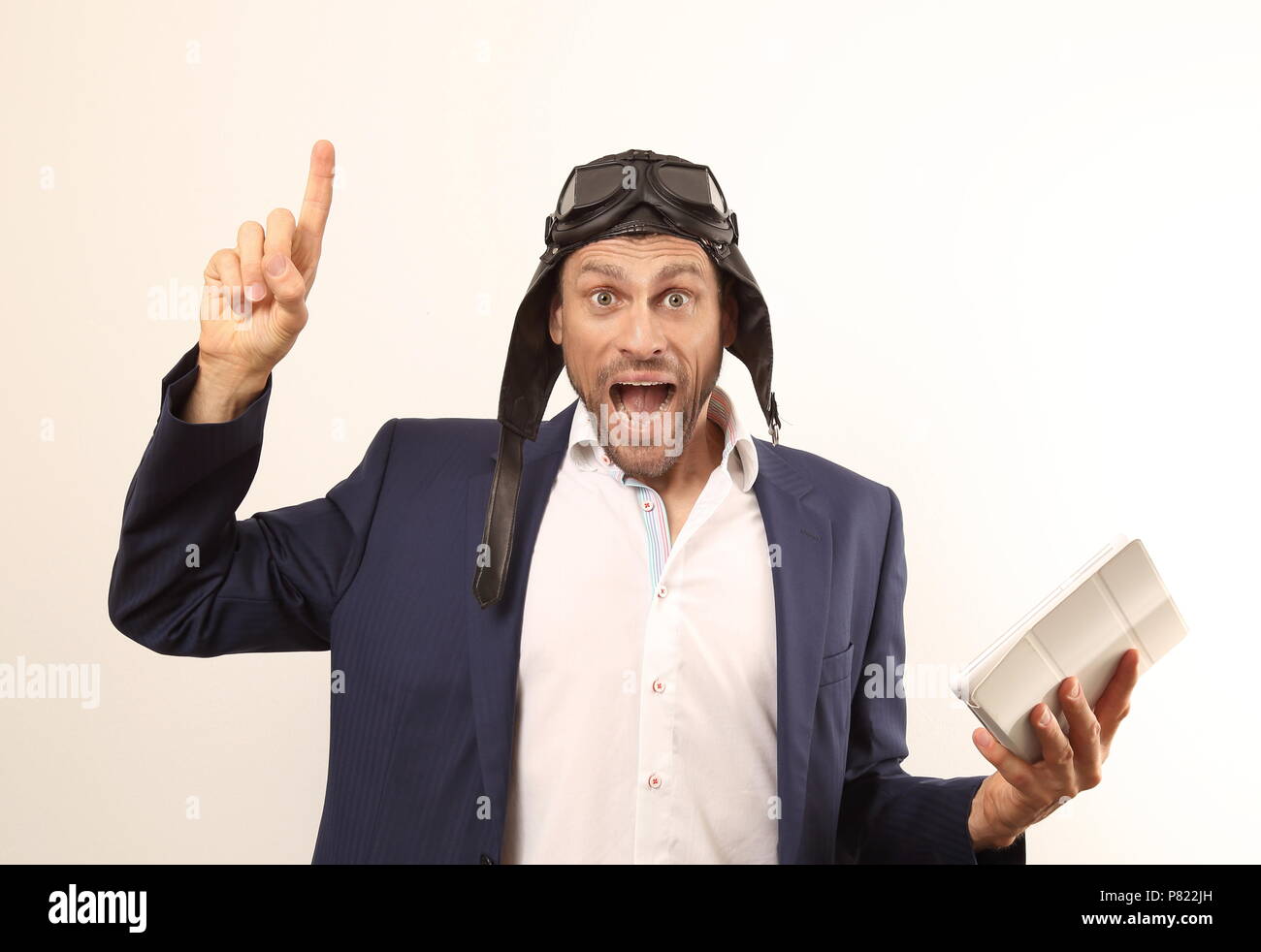 A Crazy IT automotive business nerd with tablet PC Stock Photo