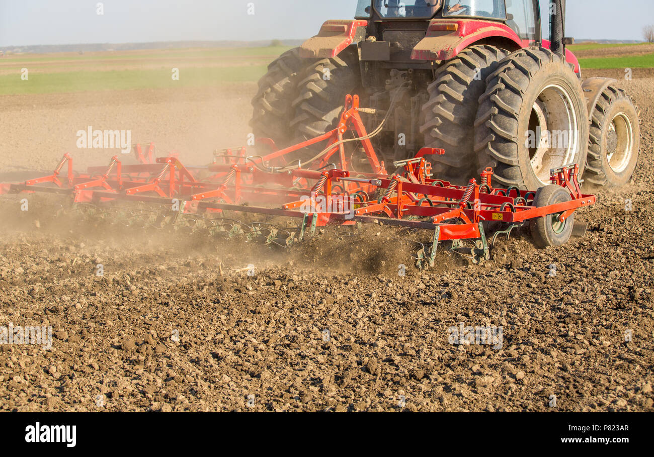 Seedbed Machine Close up shot of seedbed cultivator machine at work Stock Photo - Alamy