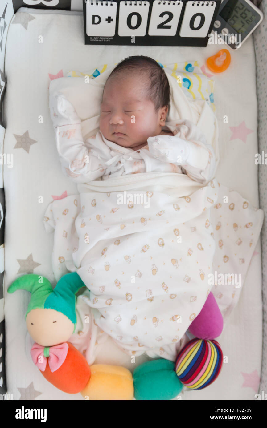 Asian baby sleeping on the bed Stock Photo Alamy