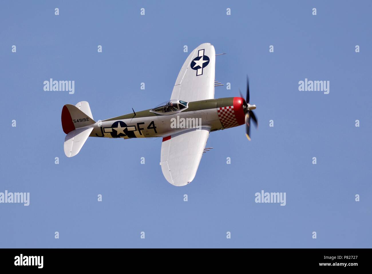 Republic P-47D Thunderbolt (G-THUN) flying at Shuttleworth Military Pageant at Old Warden on the 1st July 2018 Stock Photo