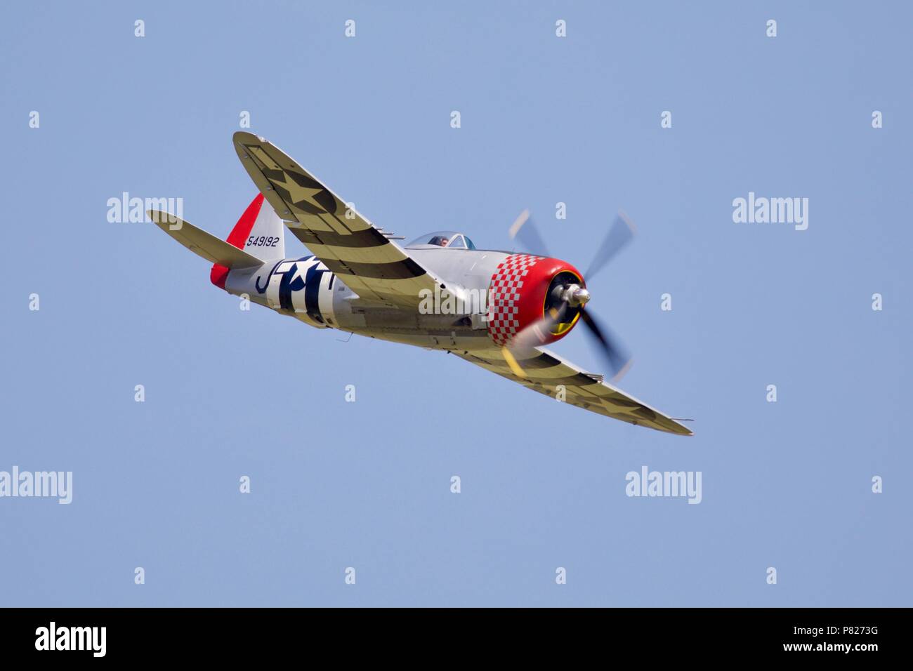 Republic P-47D Thunderbolt (G-THUN) flying at Shuttleworth Military Pageant at Old Warden on the 1st July 2018 Stock Photo