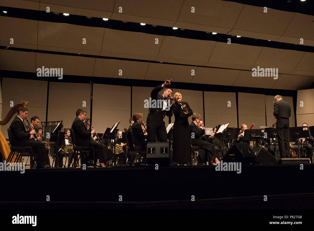 AMHERST, MASS (Mar. 6, 2016) Musician First Class Sarah Tietsort and Chief Musician Courtney Williams perform a duet with the United States Navy Band at the University of Massachussetts Fine Arts Center in Amherst, Mass. The U.S. Navy Band is on a 25-day tour of the northeastern United States. Stock Photo