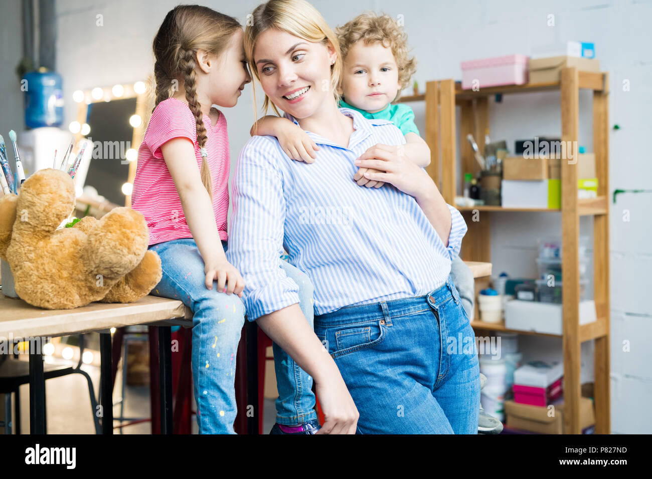 Modern Mother with Two Cute Kids Stock Photo