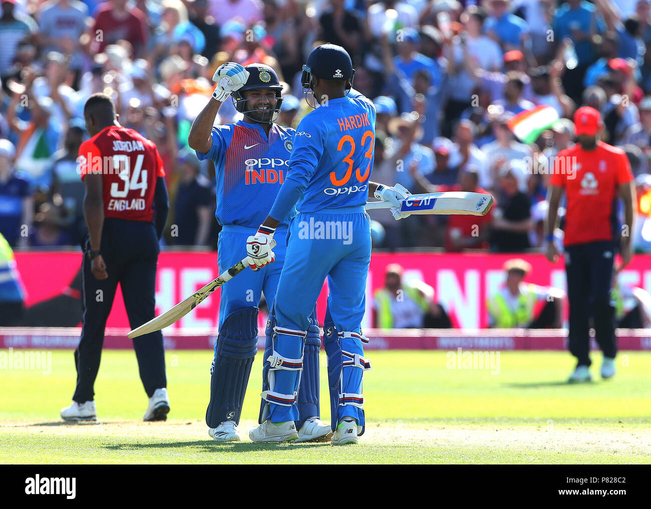 India's Rohit Sharma and Hardik Pandya celebrate beating England during ...