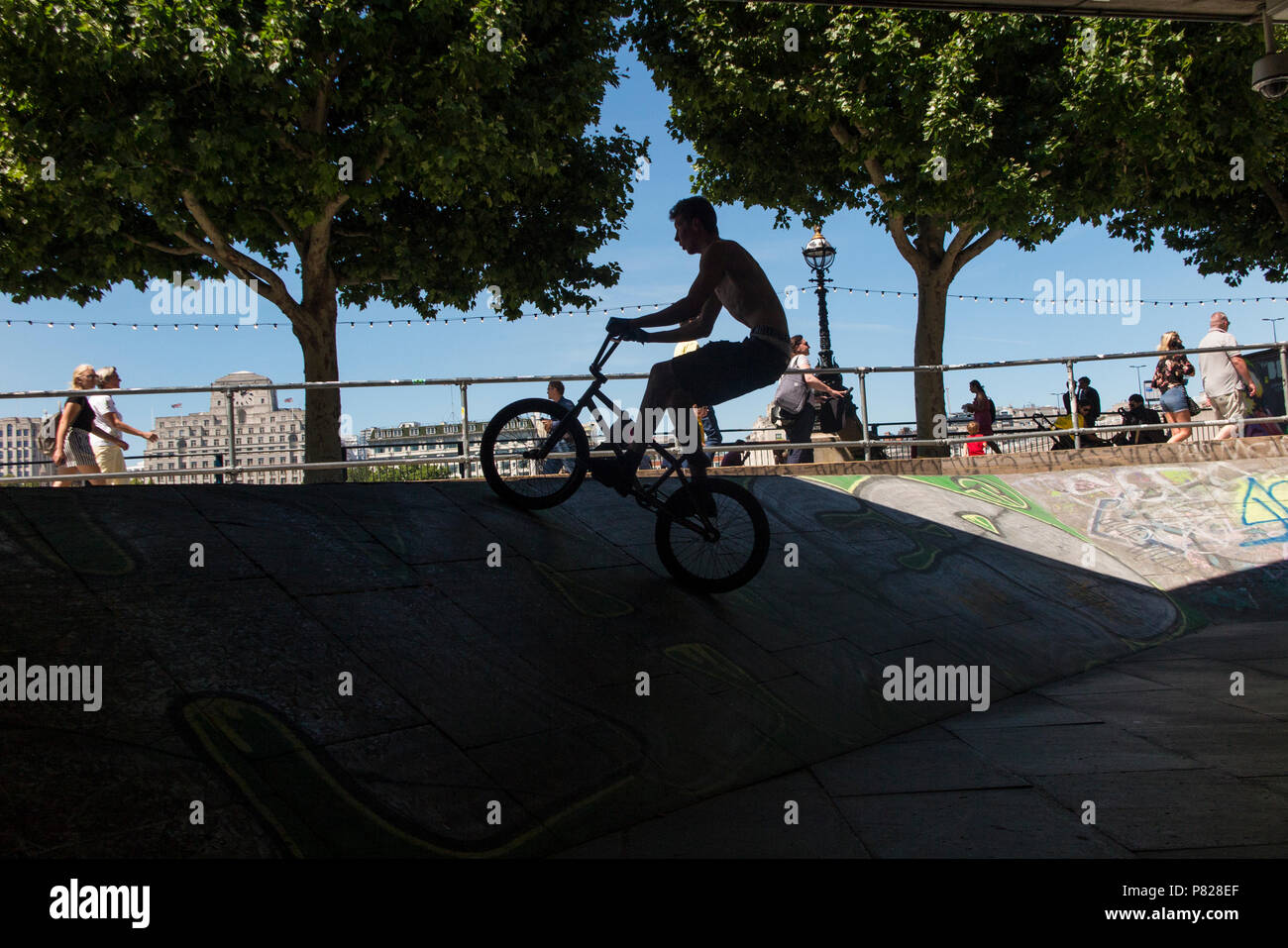 Boys on BMX bikes in London's celebrated skatepark under the South Bank centre Stock Photo