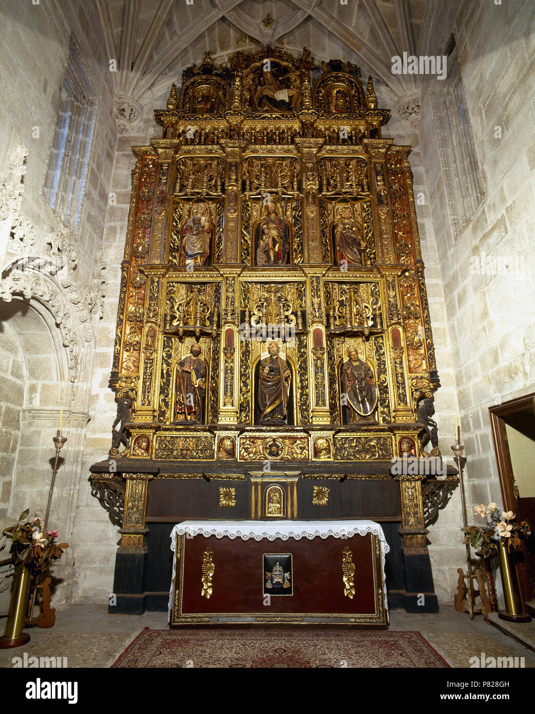 Spain, Galicia, province of La Coruña, Betanzos. Santiago Church. Gothic church built in 15th century by Fernan Perez de Andrade. Altarpiece of the Chapel of St. Peter and St. Paul. Work of the sculptor Cornielles of Holland (16th century). General view. Renaissance style. Stock Photo