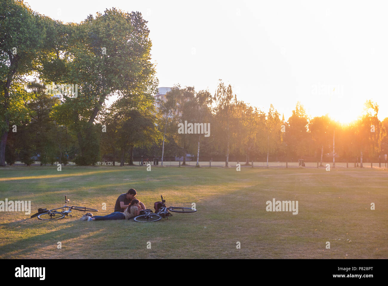 Couple on bike park london hi-res stock photography and images - Alamy