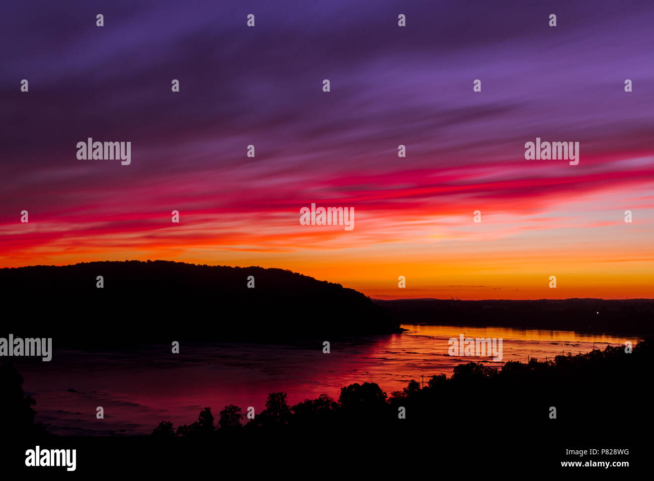 a gorgeous sunset overlooking the Susquehanna river in Columbia Pennsylvania Stock Photo