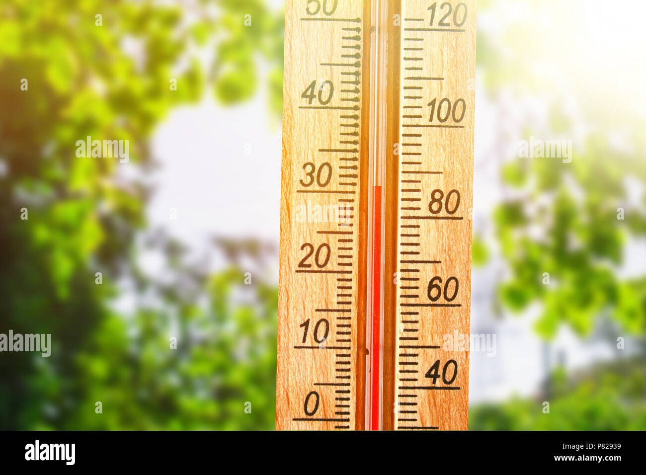 Thermometer displaying high 30 degree hot temperatures in sun summer day  Stock Photo - Alamy