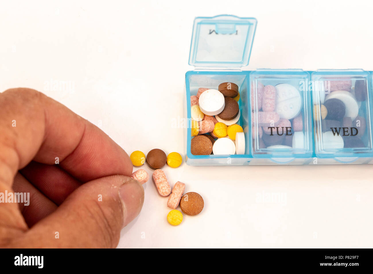 pill and drugs management daily dispenser Stock Photo Alamy