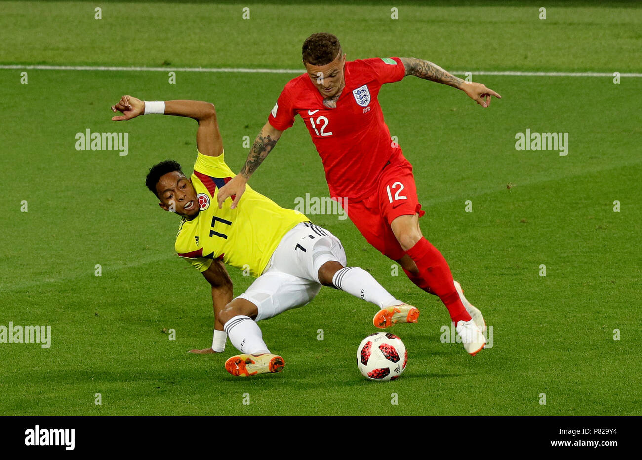 Colombia's Johan Mojica (left) and England's Kieran Trippier (right) battle for the ball Stock Photo