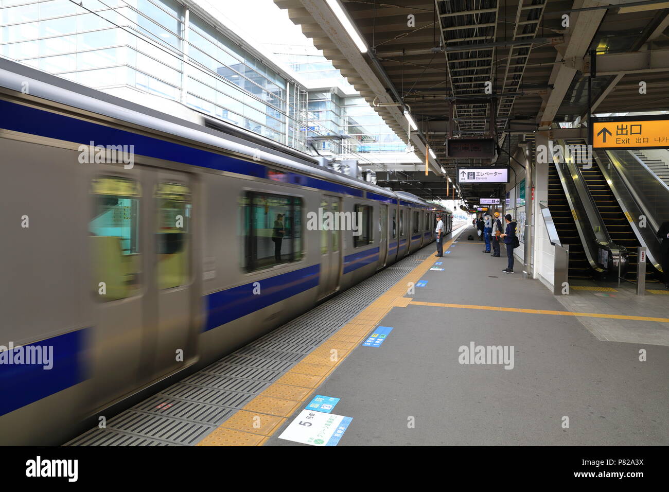 Train coming when people waiting for transportation, UENO Japan Stock Photo