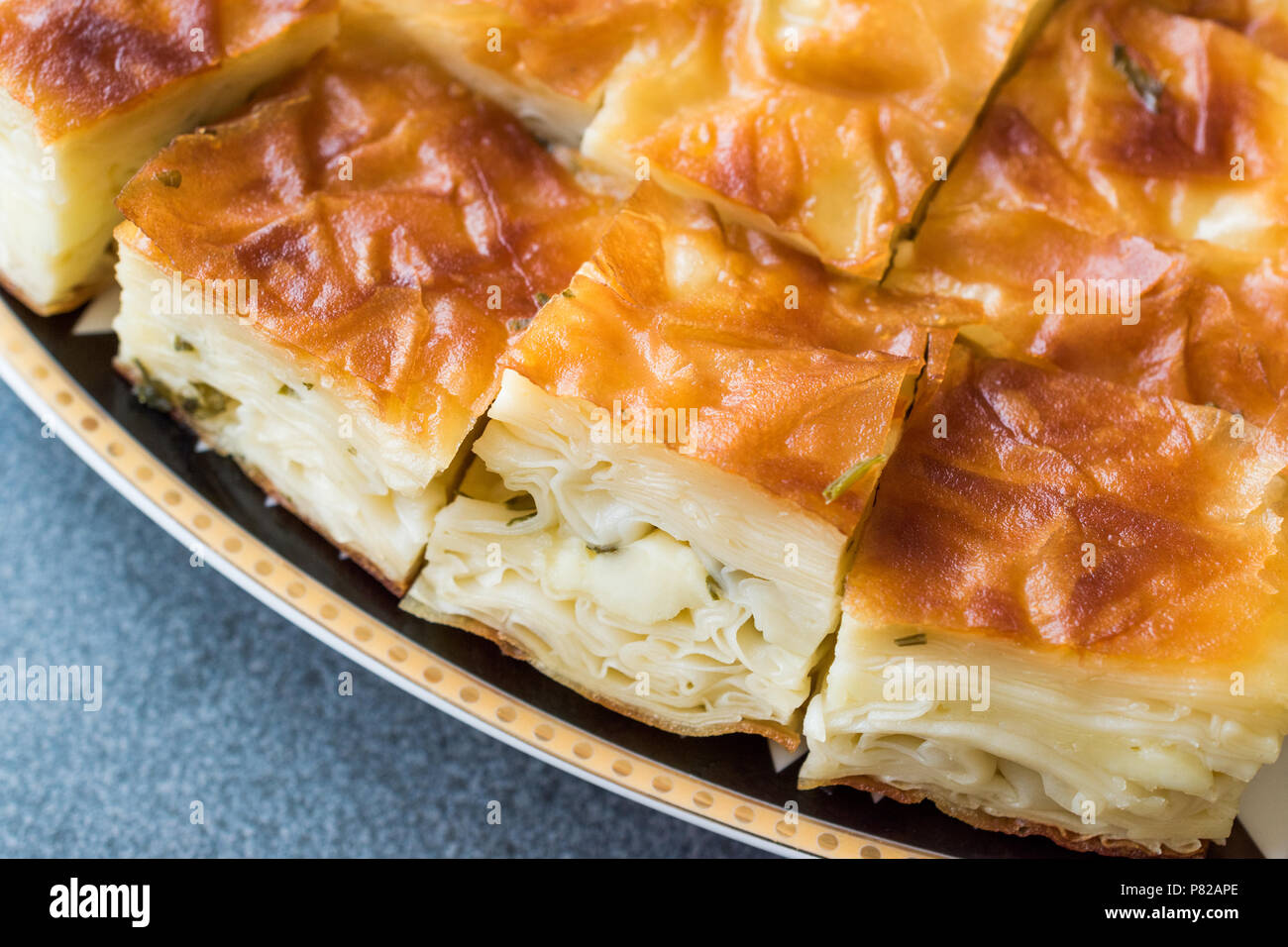 Su Boregi / Turkish Patty Borek Slices served with Plate / Burek.  Traditional Food Stock Photo - Alamy