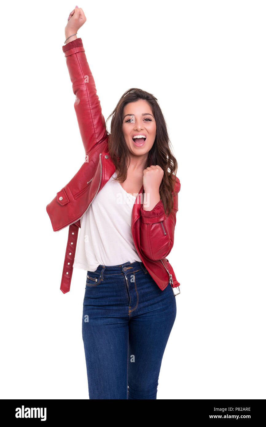 Studio shot: Happy woman with raised arms Stock Photo - Alamy