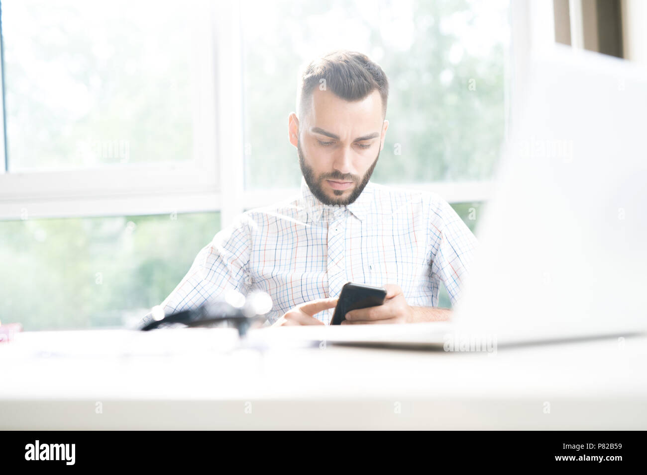 Handsome Man Using VR in Office Stock Photo