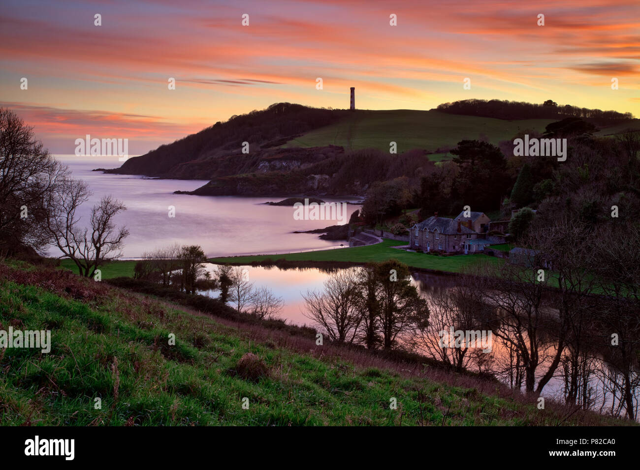 Sunset at Polridmouth Cove near Fowey in Cornwall. Stock Photo