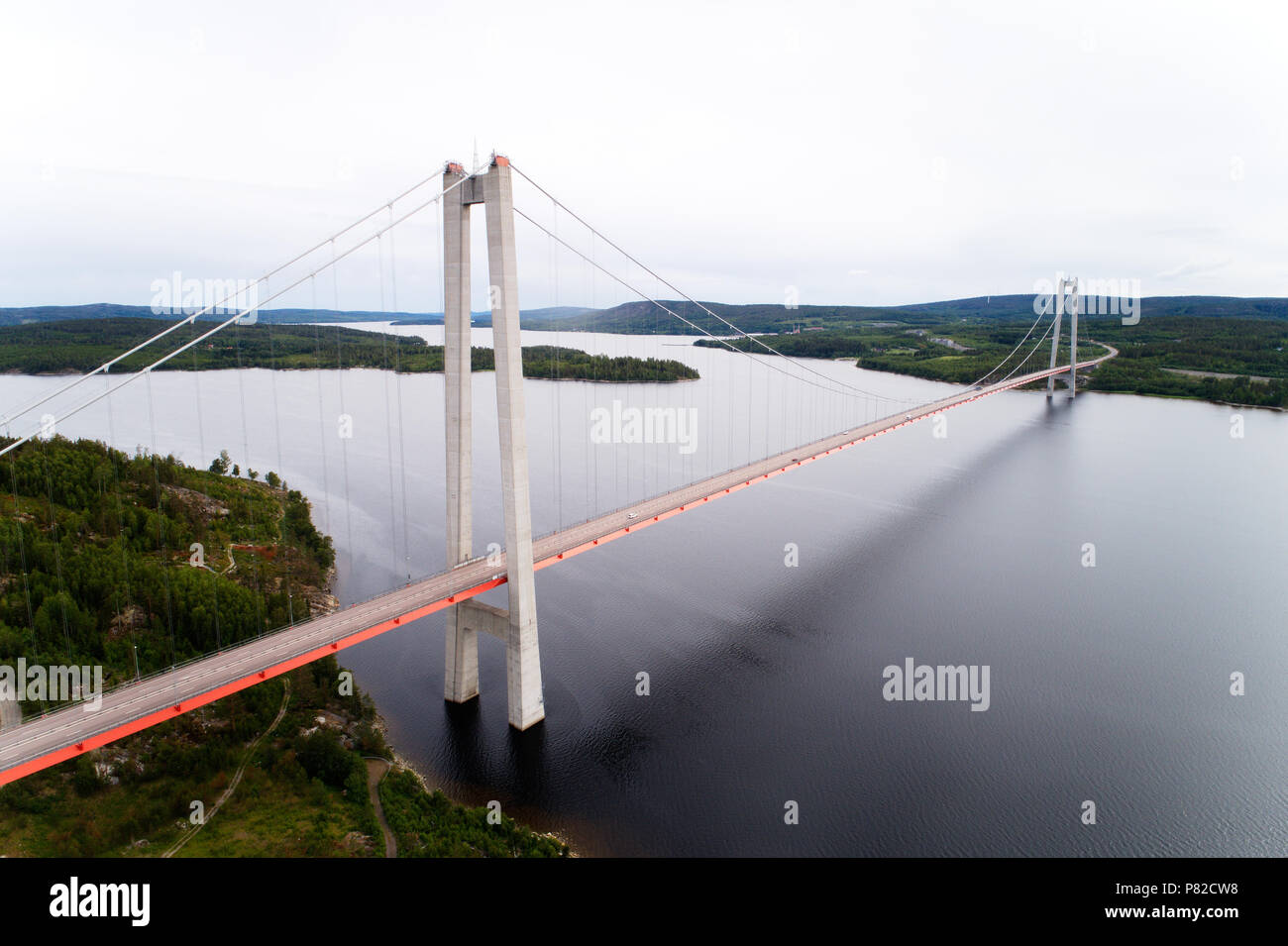 Aerial view of the High coast bridge seen from North. It is a road suspension bridge for the highway E4 over river Angermanalven i Northern Sweden. Stock Photo