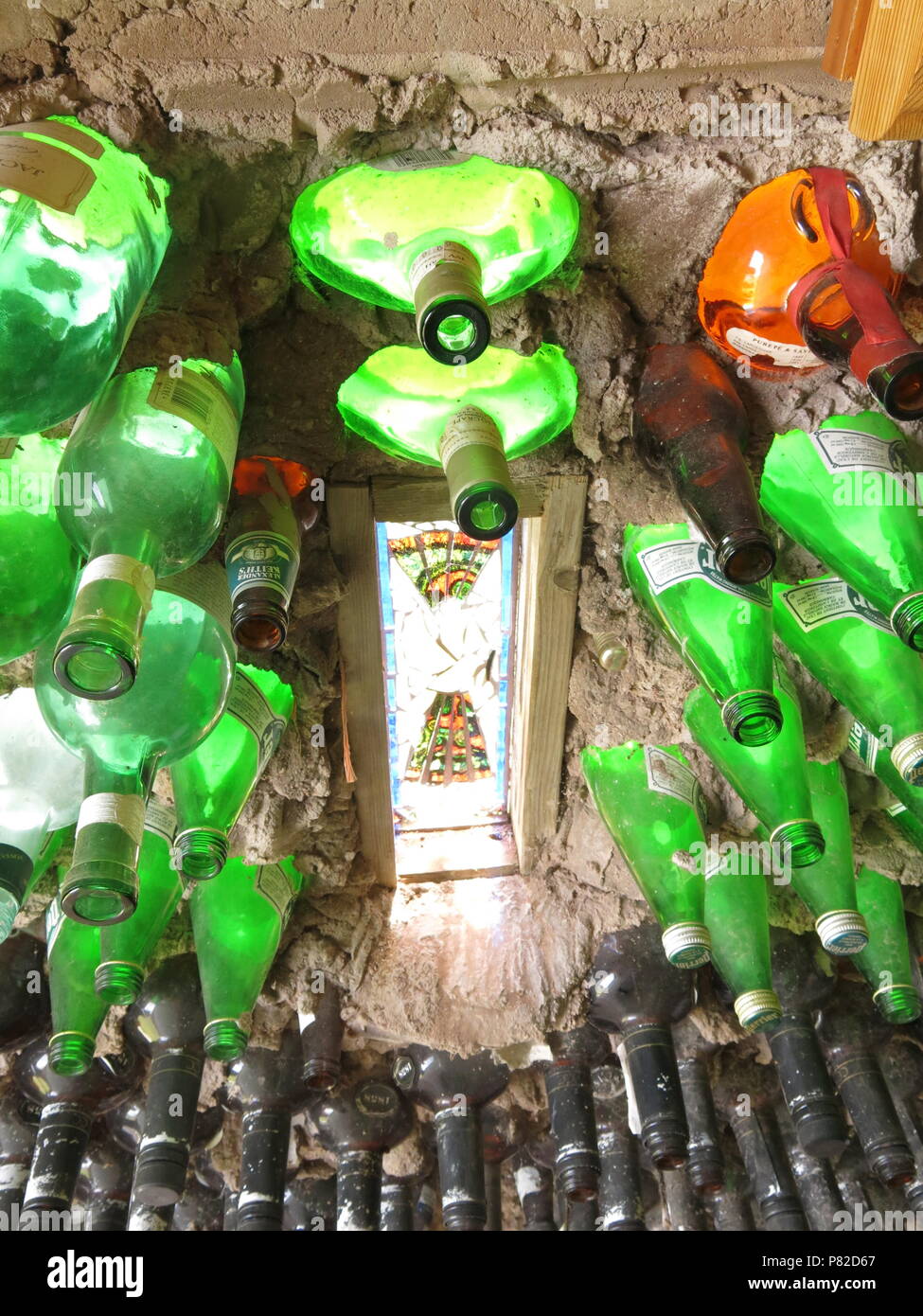 Close up of the glass bottles cemented into the ceiling in one of the