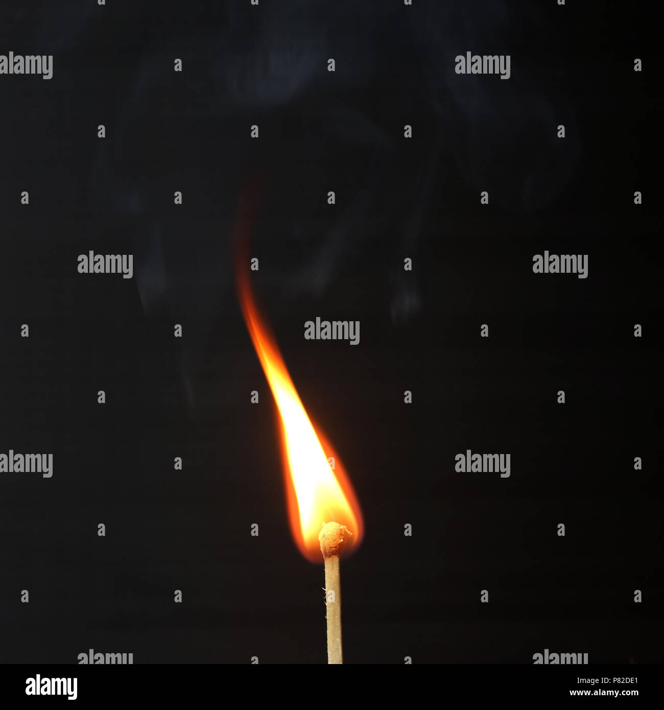 burning match with smoke isolated on black background Stock Photo - Alamy