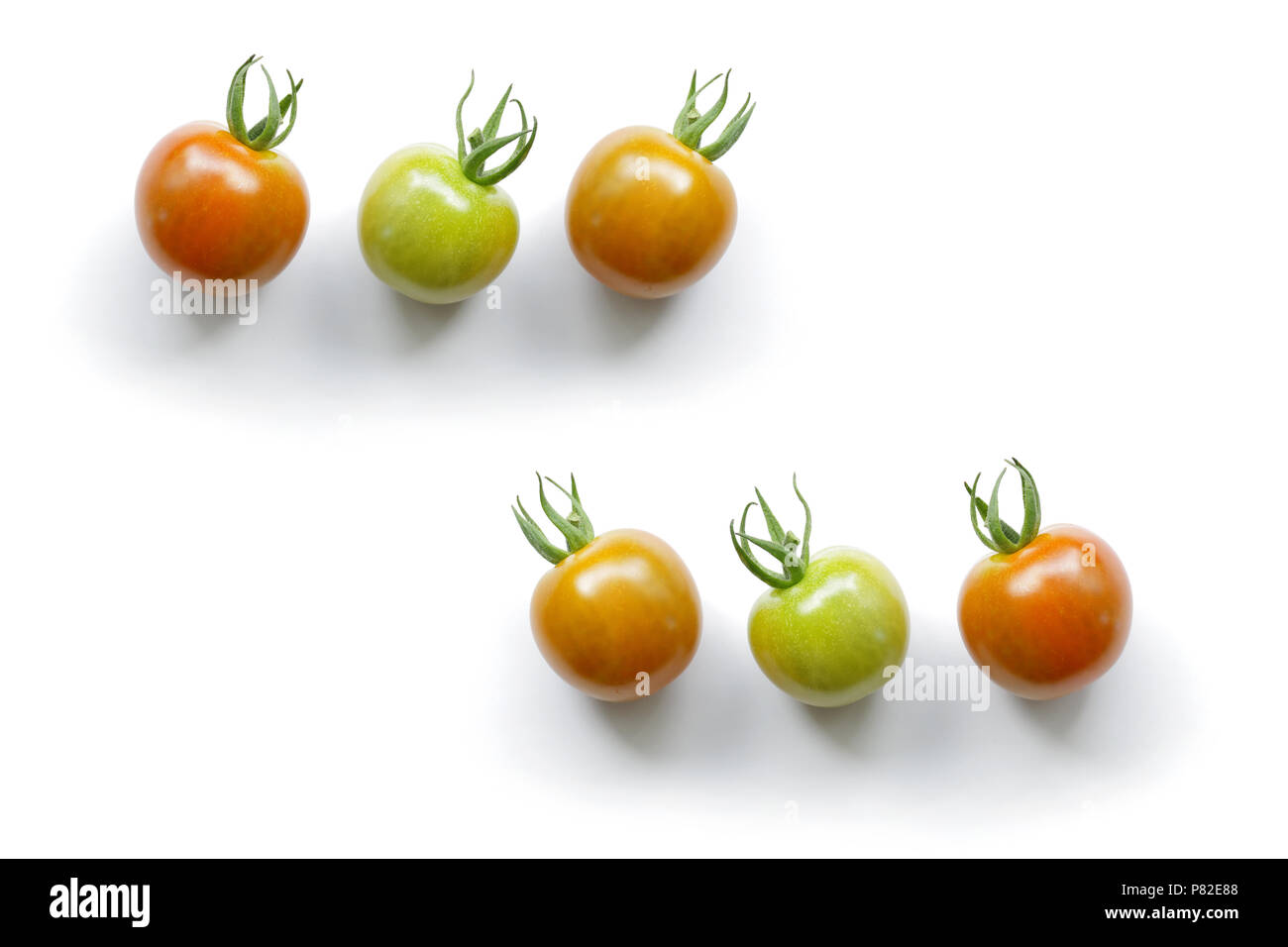 Multi colored cherry tomato isolated on white background Stock Photo