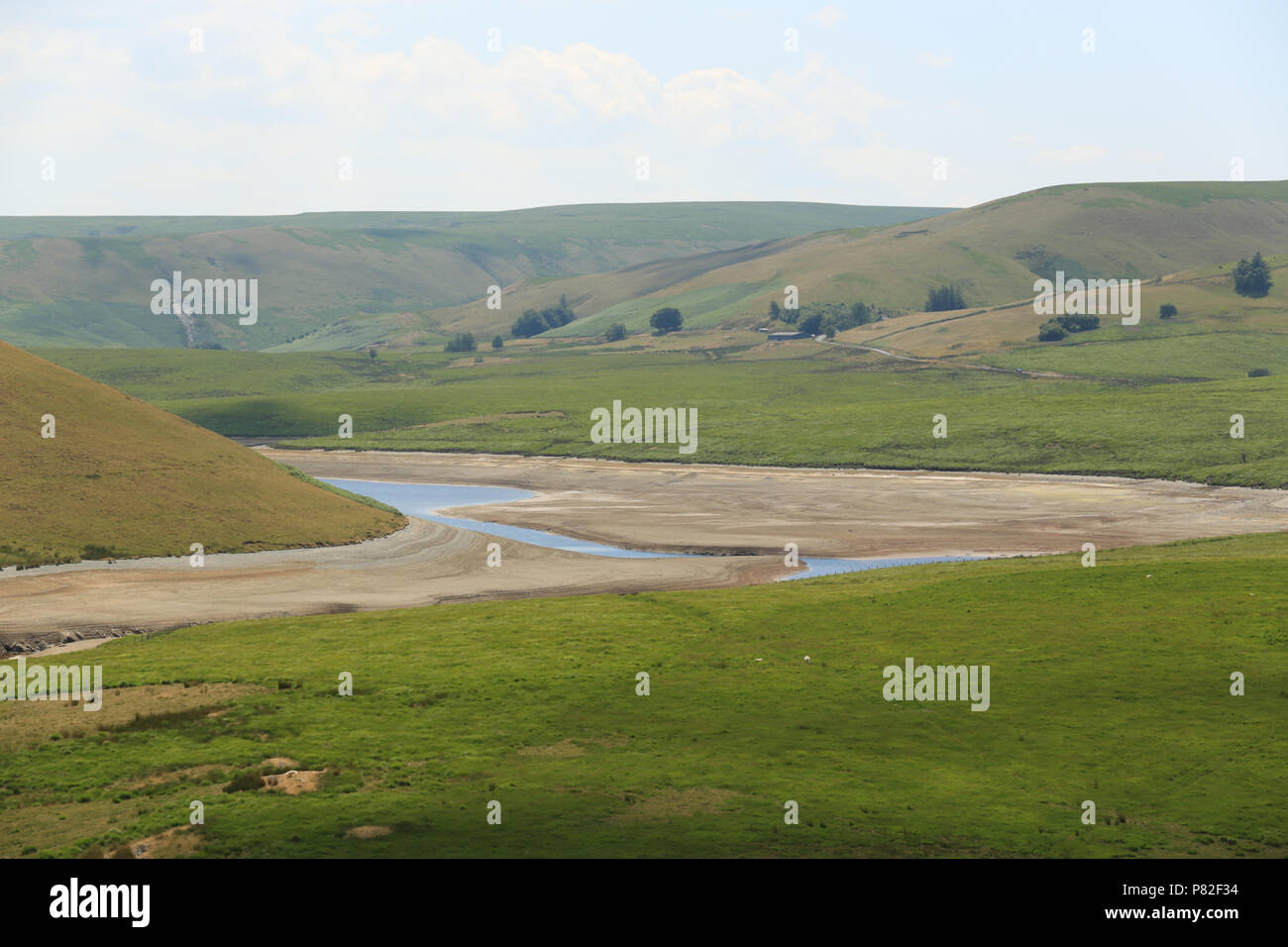 Low water levels at the Elan valley reservoirs, near Rhayader, Powys, Wales, UK. Stock Photo