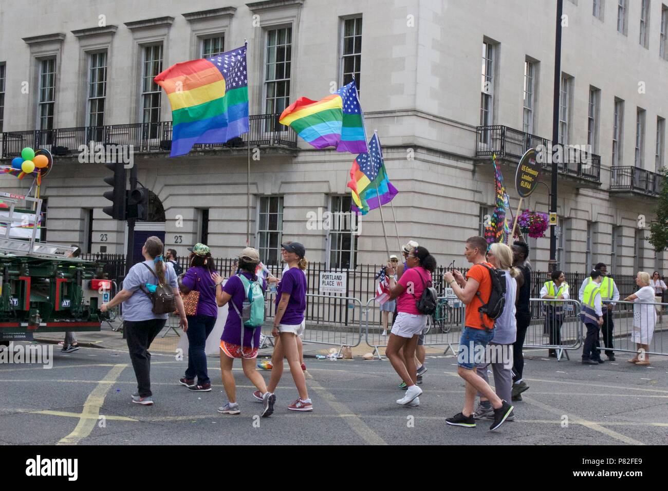 US embassy workers with rainbow US flags at Pride in London 2018 Parade Stock Photo
