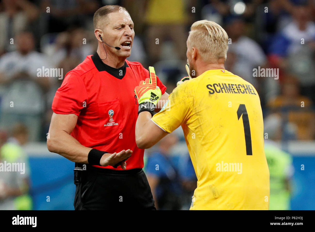 NIZHNY NOVGOROD, RUSSIA - JULY 1: Kasper Schmeichel (R) of Denmark national team argues with the referee Nestor Pitana during the 2018 FIFA World Cup Russia Round of 16 match between Croatia and Denmark at Nizhny Novgorod Stadium on July 1, 2018 in Nizhny Novgorod, Russia. MB Media Stock Photo