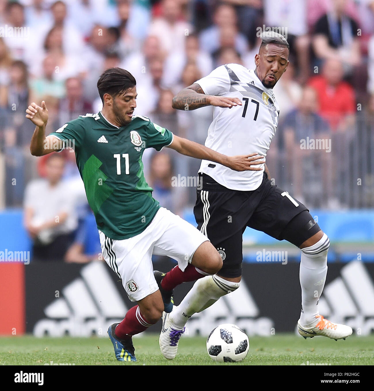 MOSCOW, RUSSIA - JUNE 17: Carlos Vela of Mexico competes with Jerome Boateng of Germany during the 2018 FIFA World Cup Russia group F match between Germany and Mexico at Luzhniki Stadium on June 17, 2018 in Moscow, Russia. (Photo by Lukasz Laskowski/PressFocus/MB Media) Stock Photo